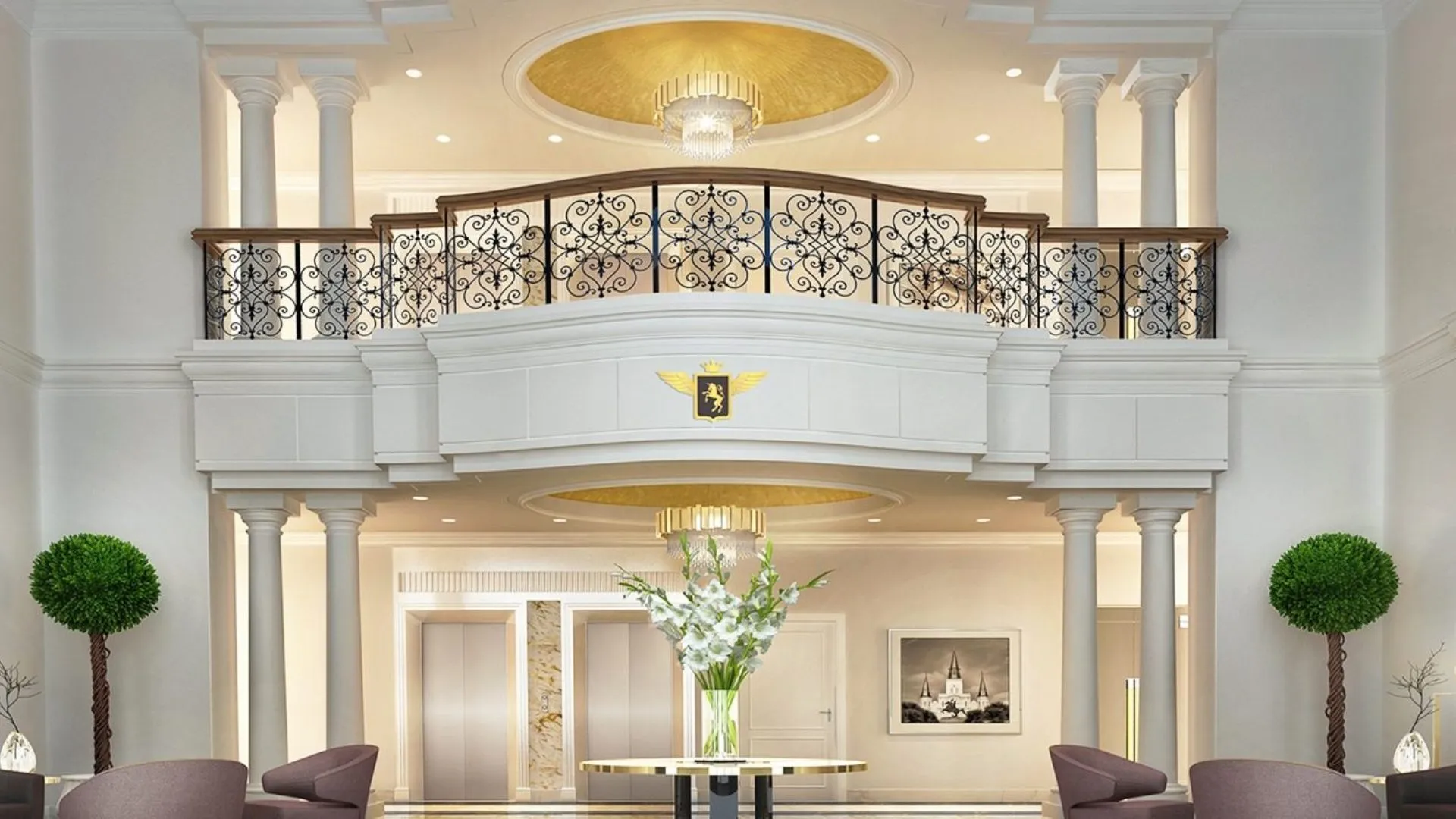 Hall d’ingresso elegante del complesso Vincitore Benessere a Dubai, con design classico e dettagli dorati.